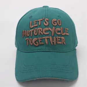 Detail of 3D letter embroidery and stitch craft on a dark green cotton baseball cap