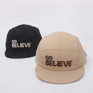 Flat brim kids baseball caps in black and khaki with GO BELIEVE 3D letter embroidery