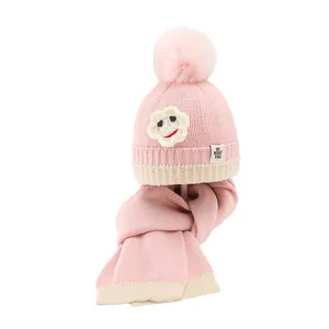 Rosa Winter Strickmütze und Schal Set mit Bommeln und Blumen für Kinder