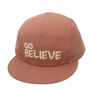 Brown five-panel flat brim baseball cap with white GO BELIEVE embroidery for kids