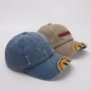 Distressed vintage cotton baseball caps with letter embroidery and smiley face patch