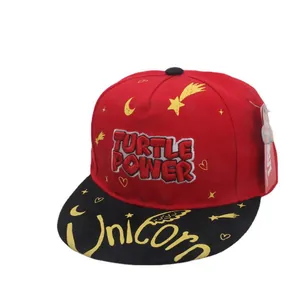 Red and black snapback hat with Turtle Power embroidery and yellow flat brim detailing