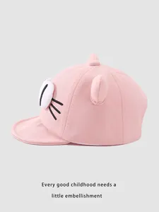 Detail of pink cotton baby cap with cartoon cat face embroidery and 3D plush ears