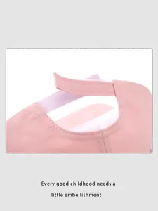 Detail view of pink baby baseball cap showing the adjustable velcro strap for comfort