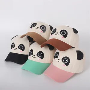 Close-up of children's cotton panda baseball caps with 3D ears and multi-colored brims