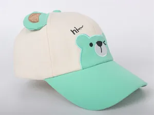 Detail of kids baseball cap featuring cartoon bear embroidery and 3D ear accents