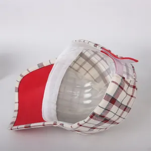 Detail of red, white, and blue checkered kids baseball cap with internal sweatband view