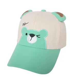 Kids baseball cap featuring cute bear embroidery and 3D ears in beige and mint green