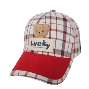 Kids plaid baseball cap with red brim and plush lucky bear embroidery for spring