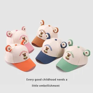 Kids' HAPPY BABY bear baseball caps in pink, brown, green, and blue-orange colors