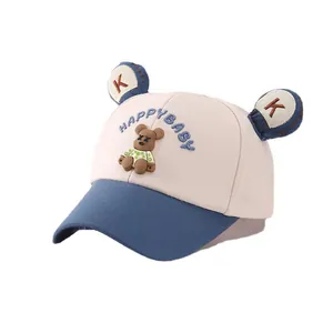 Two-tone kids baseball cap with bear patch and Happy Baby embroidery in cream and navy