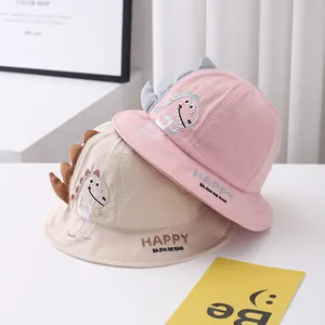 Cute children dinosaur bucket hats in pink and beige with protective sun shades