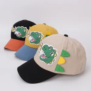 Kids colorful cartoon dinosaur baseball caps in orange, blue and beige contrast colors