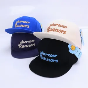 Detail of four colorful snapback hats with bold Runnors embroidery and premium cotton texture