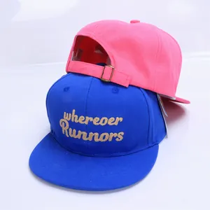 Flat brim baseball caps for kids in pink and blue with adjustable strap and embroidery