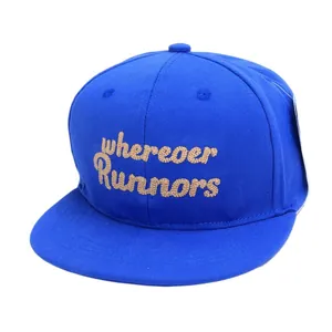 Front view of a blue flat brim baseball cap with gold 'RUN' embroidery for children