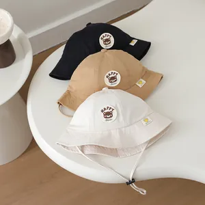 Three-pack cotton baby bucket hats with Happy Bear embroidery and adjustable chin straps