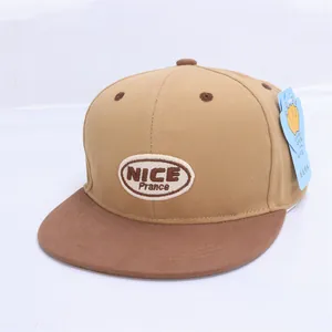 Detailed view of kids hip hop baseball cap featuring NICE embroidery and flat brim