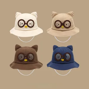 Detailed grid of cotton kids bucket hats with cat ears and glasses patch in four colors