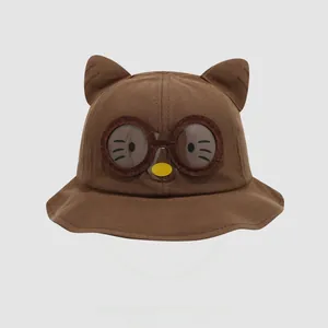 Detailed view of kids cotton sun hat with 3D cat ears and cute glasses embroidery