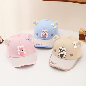 Baby baseball caps with cute cartoon rabbits and 3D ears in pink, blue and beige colors