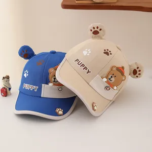 Kids cartoon baseball cap with cute bear patches and 3D ears in blue and beige