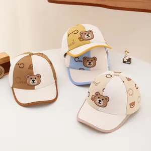 Detailed collection of kids baseball caps featuring cute 3D bear patches and color blocks