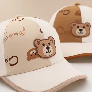 Kids colorblock baseball cap featuring 3D bear decoration and artistic Good font