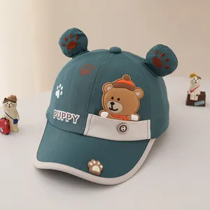 Detail of dark teal kids baseball cap featuring 3D bear ears and puppy embroidery