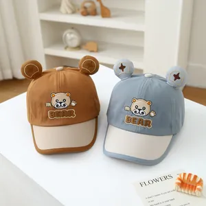Infant cotton baseball cap with bear embroidery and 3D ears in brown and blue