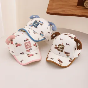 Toddler baseball cap with cartoon dog ears and OK patch in pink, blue, and brown