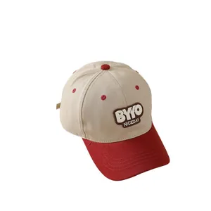 Kids baseball cap with beige crown, red brim, and BYYO NICEDAY letter embroidery