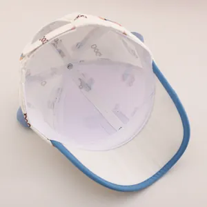 Detailed view of kids baseball cap inner lining and reinforced top button structure