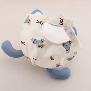 Detail of adjustable velcro strap and cartoon dog print on toddler baseball cap