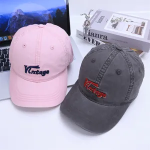 Detailed embroidery of Vintage text on cotton twill kids baseball caps in pink and grey
