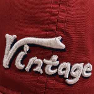 Kids vintage baseball cap in red twill fabric with 3D letter embroidery and sun protection