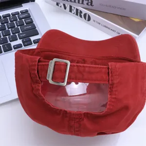 Rear view of red kids baseball cap with metal buckle and clear PVC panel detail