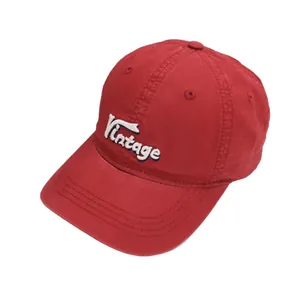 Red kids baseball cap with vintage embroidery showing a 45-degree angle view