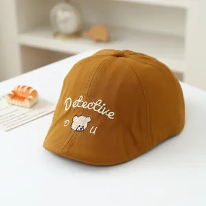 Caramel retro detective style baby beret with cute bear embroidery and text