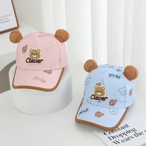 Cute kids baseball caps with bear ears in pink and blue featuring Clever embroidery