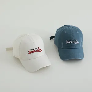 Detailed close-up of vintage distressed cotton baseball caps with NICE DAY embroidery