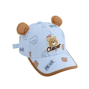 Light blue baby baseball cap with cute bear ears and Clever embroidery on white background