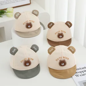 Collection of baby cotton baseball caps with cute bear embroidery and soft brim in four colors