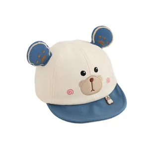 Cute bear-themed baby baseball cap with 3D ears and cartoon embroidery in beige and blue