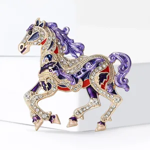 Sparkling crystal pony brooch with gold finish and purple enamel details for women