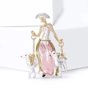 Artistic alloy enamel brooch featuring a woman walking two hounds with a golden metal finish