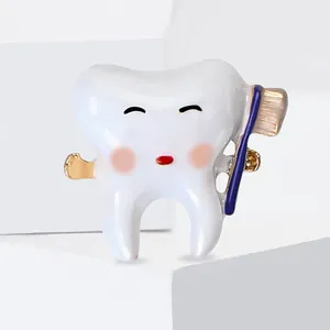 Creative cartoon tooth enamel brooch with toothbrush, minimalist accessory for dental gifts