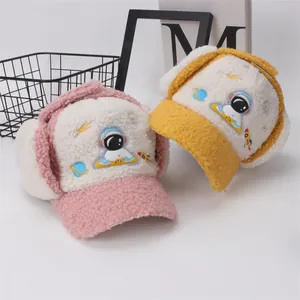 Kids warm fleece trapper hat with astronaut embroidery in pink and yellow colors