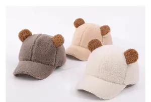 Detailed texture of plush sherpa fleece baseball caps with cute bear ears in three colors