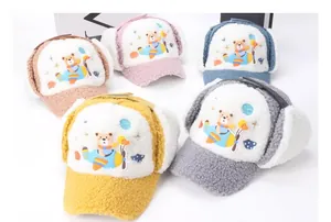 Detailed view of kids windproof trapper hats in five colors with plush ear flaps